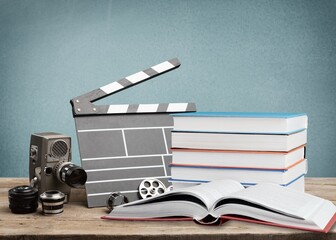 Set old books and Movies slate on the desk