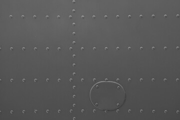 Aluminum sheet and rivet fastening. Aviation background.