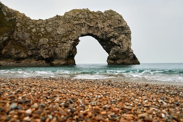 Scenic view of Durdle Door in the sea in Dorset, England