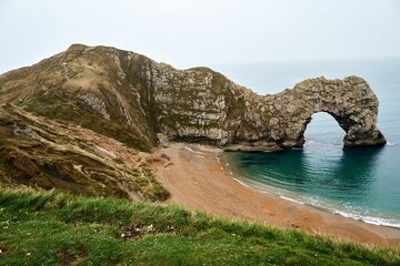 Scenic view of Durdle Door in the sea in Dorset, England