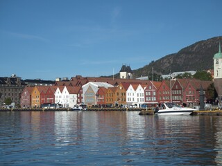 Obraz premium Bergen, Norway. View of historic buildings at Bryggen - Hanseatic Quay in Bergen, Norway. UNESCO World Heritage Site, bryggen