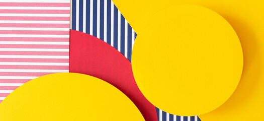 Abstract trendy fashion colored papers texture background in memphis geometry style. Yellow, red,...