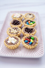 Cheese tart, chocolate tart, strawberry tart and various types of tarts are served to be eaten on Eid.