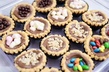 Cheese tart, chocolate tart, strawberry tart and various types of tarts are served to be eaten on Eid.