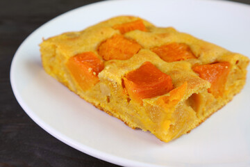 A Slice of Delectable Homemade Butternut Squash Cake Bar on White Plate