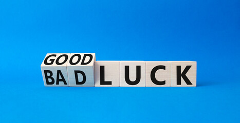 Good Luck and bad Luck symbol. Turned wooden cubes with words Bad Luck and Good Luck. Beautiful...