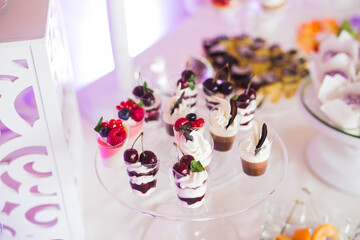 Delicious wedding reception candy bar dessert table