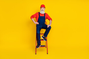 Full length photo of professional pensioner senior plumber sit ladder isolated on shine color background