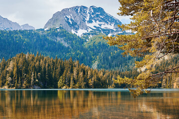 Fototapeta premium Montenegro Bobotov kuk peak and black lake with autumn nature and plants. Famous nature landscapes