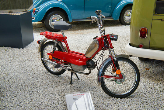 SPEYER, GERMANY - OCTOBER 2022: red KREIDLER MOPED MF 2 C 1974 in the Technikmuseum Speyer