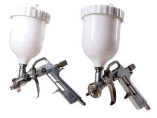 A metal paint spray gun on an isolated background.