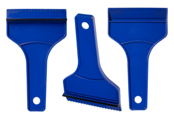 Plastic car window ice scraper on isolated background.