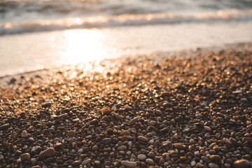 Obraz premium Background of sea shore over sun set with lights. Nature texture. Selective focus.