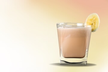 Tasty aroma coffee in a glass cup on the background