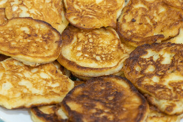 Homemade fried pancakes in a bowl