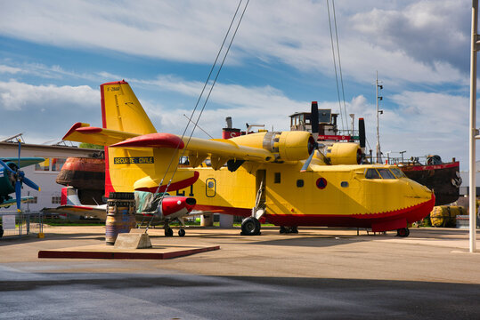 SPEYER, GERMANY - OCTOBER 2022: yellow Canadair CL-215 Scooper flying boat amphibious aircraft designed and built by Canadian aircraft manufacturer Canadair 1969 in the Technikmuseum Speyer