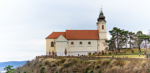 Tihany, Hungary - view of the famous Benedictine Monastery of Tihany (Tihany Abbey) with blue sky...