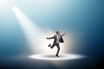Business people under the spotlight