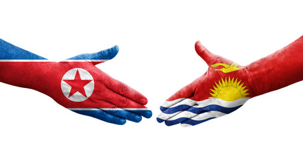 Handshake between Kiribati and North Korea flags painted on hands, isolated transparent image.