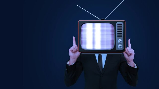 Businessman Head with vintage retro television. Business person with Old Fashioned TV on his Face. Replaceable Green Screen with copy space. Concept of News, Surrealism and Advertising Display 