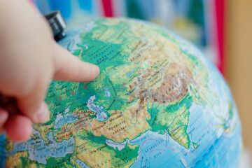 Time for a transfer. choose a new location. globe model.