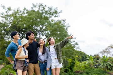 Group of Asian people enjoy and fun outdoor lifestyle hiking and camping together on summer holiday...