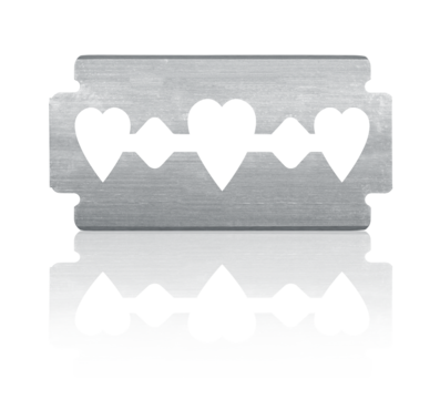 Razor blade with heart shape and reflection isolated