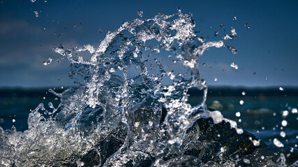 Waves crash on the north shore rocks of long island new york © Tommy
