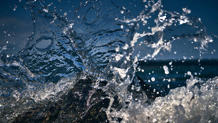 Waves crash on the north shore rocks of long island new york