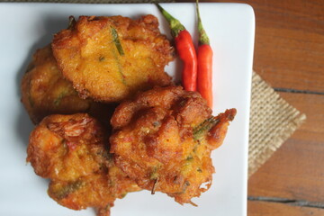 Corn cakes or also called bakwan corn is a food made from corn, flour, chicken eggs, and fried.  This food comes from Indonesia