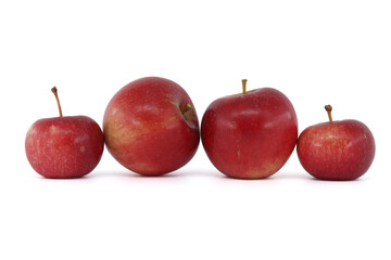 Freshly picked red apples on a white background