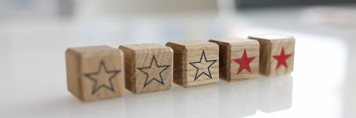 Wooden cubes with three stars out of five