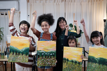 Group of art people in classroom studio, a teacher and student kids proud show painting work, an...