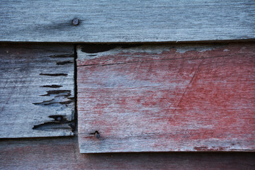 rusty nail on old wood background