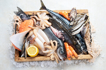 Fresh fish and seafood arrangement. Healthy eating concept. Top view..