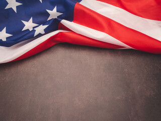 Top view of the American flag on a vintage background