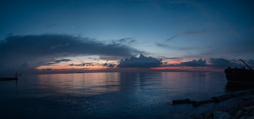 Naklejka na ściany i meble sunset over the ocean panoramic cover nature background.