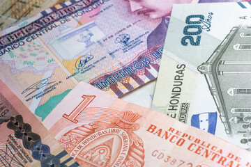 Closed up shot of several Honduran bills with different denominations.