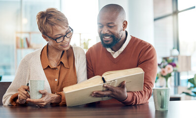 Family, worship and elderly couple with a bible, reading and relax with coffee at table in their...