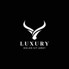 Abstract cow steak premium logo design. Creative bull horns line icon symbol. Luxury wings bird logotype.
