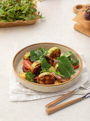 Portion of gourmet warm salad with veal and zucchini