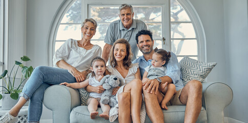 Happy family, portrait and relax on a sofa with happy, smile and cheerful people in their home...