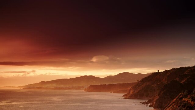 Coast landscape at sunset. Cliffs of Maro Cerro Gordo Natural Park, near Maro and Nerja, Malaga province, Costa Del Sol, Andalusia, Spain.
