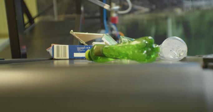 modern industrial waste processing.household waste moves along the conveyor of the sorting line.close-up.