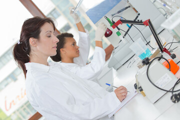 Two women working in laboratory