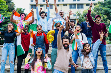 excited audience celebrating sixer by shouting and screaming by showing hand gestures and signs while watching cricket match at stadium - concept of entertainment, enjoyment and joyful spectators