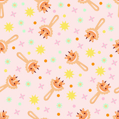 Seamless pattern with baby cow rattle. Children's pattern on textiles. Gentle children's  pink background