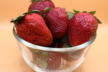 strawberries in a glass bowl