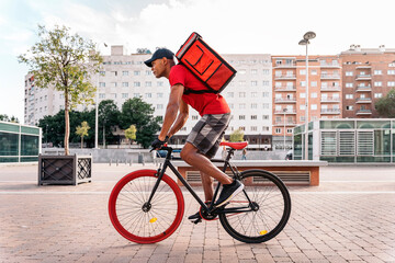African Delivery Man Riding Bike
