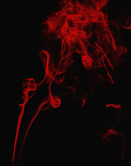 red smoke on a dark background. Abstract background black smoke pollution. Overlay layer.